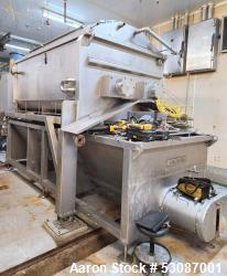 Used- Karl Schnell Paddle Mixer, Stainless Steel. Approximately 140 cubic feet, 4000 Liter capacity. Has stainless steel fee...