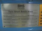Used BHS Twin Shaft Batch Mixer.  It has a 60 liter capacity in the hopper and is stainless steel.  Footprint is 3' x 3' and 5' high.  It has a VFD inside a control panel and manual.  The mixer is 3 ...