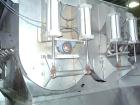 USED: FPEC paddle mixer, stainless steel construction, 10,000 lbcapacity/200 cu ft. Equipped with (2) 50 hp drive motors, CO2 hood.Reported recently rebuilt and suitable for USDA applications.
