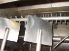 Used Halvor Forberg Twin Shaft Fluidizer, Model 795, Stainless Steel. Chamber approximately 52’’ long x 60’’ wide. (2) 3-1/2’’ diameter shafts with (14) paddles per shaft,  paddles 9-1/4’’ x 10’’ wel...