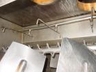 Used Halvor Forberg Twin Shaft Fluidizer, Model 795, Stainless Steel. Chamber approximately 52’’ long x 60’’ wide. (2) 3-1/2’’ diameter shafts with (14) paddles per shaft,  paddles 9-1/4’’ x 10’’ wel...