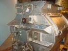 Used Halvor Forberg Twin Shaft Fluidizer, Model 795, Stainless Steel. Chamber approximately 52’’ long x 60’’ wide. (2) 3-1/2’’ diameter shafts with (14) paddles per shaft,  paddles 9-1/4’’ x 10’’ wel...