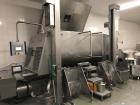 Used Inotec Double Paddle Vacuum Mixer, Type IM3000V. Stainless steel construction. Working capacity 105.9 cubic feet (3000 liters). Double shafts with each 6 paddles. Double end product discharge. C...