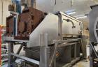 Used Karl Schnell Paddle Mixer, Stainless Steel. Approximately 140 cubic feet, 4000 Liter capacity. Has stainless steel feed hopper with dual screw conveyors, driven by (2) Approximate 5.4HP drive ge...