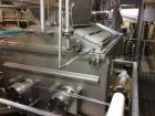 Used Karl Schnell Paddle Mixer, Stainless Steel. Approximately 140 cubic feet, 4000 Liter capacity. Has stainless steel feed hopper with dual screw conveyors, driven by (2) Approximate 5.4HP drive ge...