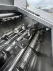 Used Karl Schnell Paddle Mixer, Stainless Steel. Approximately 140 cubic feet, 4000 Liter capacity. Has stainless steel feed hopper with dual screw conveyors, driven by (2) Approximate 5.4HP drive ge...