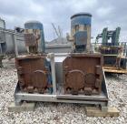 Used Karl Schnell Paddle Mixer, Stainless Steel. Approximately 140 cubic feet, 4000 Liter capacity. Has stainless steel feed hopper with dual screw conveyors, driven by (2) Approximate 5.4HP drive ge...