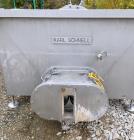 Used Karl Schnell Paddle Mixer, Stainless Steel. Approximately 140 cubic feet, 4000 Liter capacity. Has stainless steel feed hopper with dual screw conveyors, driven by (2) Approximate 5.4HP drive ge...