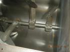 Used Kelly Duplex Horizontal Mixer. Approximately 100 cubic foot capacity, approximately 85 rpm. Dimensions: 96.25