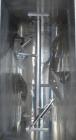 Used Marion Paddle Mixer, Model 1001, 1.5 cubic foot working capacity. 304 stainless steel clad; carbon steel outside. Non-jacketed trough 12