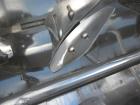 Used Marion Paddle Mixer, Model 1001, 1.5 cubic foot working capacity. 304 stainless steel clad; carbon steel outside. Non-jacketed trough 12