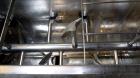 Used- Marion Semi-Cylindrical Paddle Mixer, approximately 300 cubic feet working capacity, 304 stainless steel. Non-jacketed...