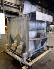 Used Marion Paddle Mixer, 304 Stainless Steel. Approximate 109 cubic feet/500 Pound Working Capacity. Non-jacketed tough approximately 73