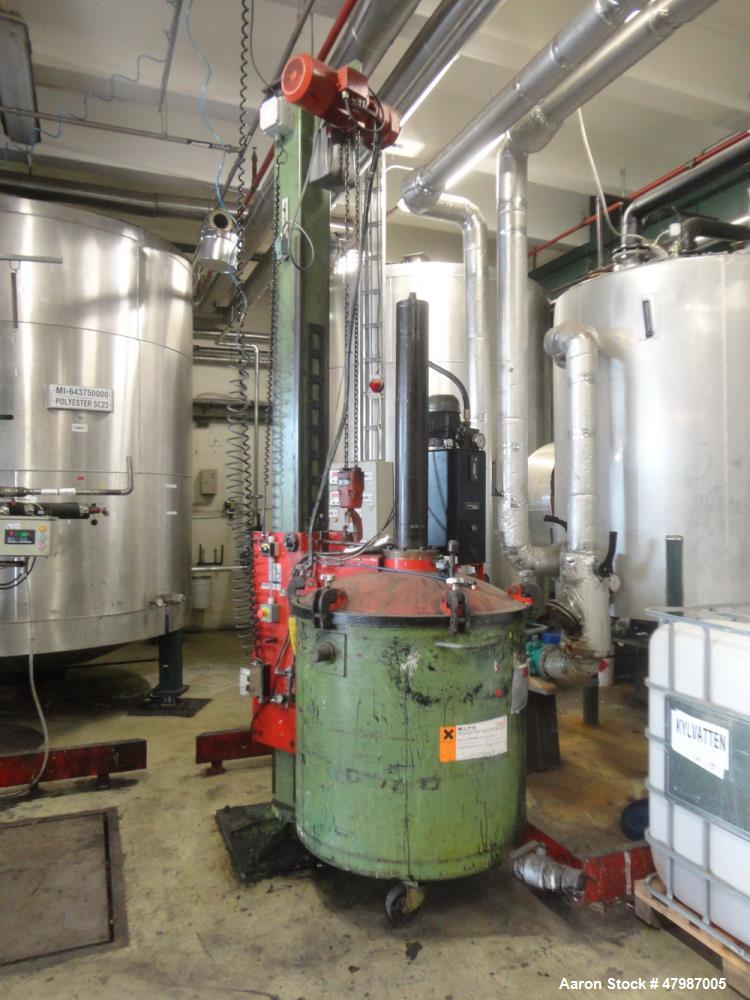 Used Buhler Press-Out Unit, Removable Head Design, Type B 1100-K/SWF. Serial#10418858/5998, new 2000. The press out unit has a removable head that accepts an 1100mm diameter (43.3”) mixing tank. The ...
