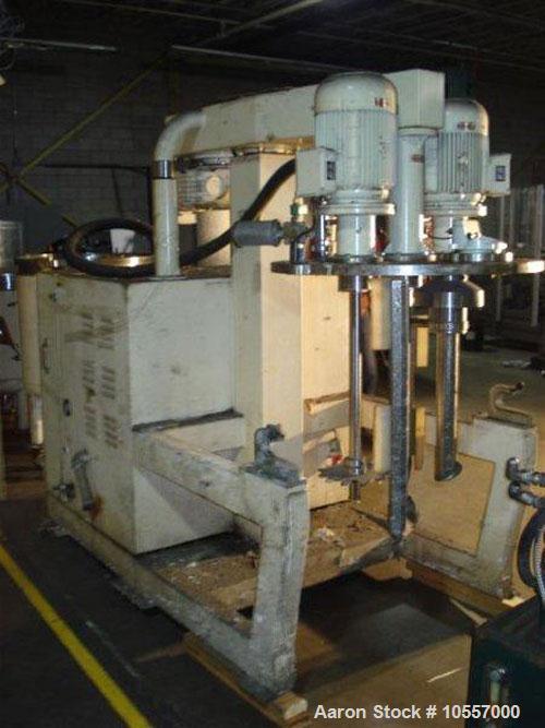 Used-Fryma Model 400 Vacuum Mixer.  Includes (2) jacketed mixing tanks measuring 33.25" diameter x 38" deep.  Agitation has ...