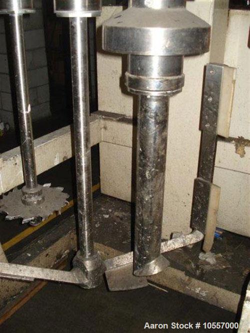 Used Fryma Model 400 Vacuum Mixer.  Includes (2) jacketed mixing tanks measuring 33.25" diameter x 38" deep.  Agitation has scrape surface, auger and dispenser.  Hydraulic bowl lift.  Machine footpri...