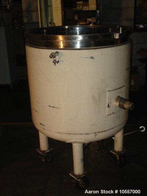 Used-Fryma Model 400 Vacuum Mixer.  Includes (2) jacketed mixing tanks measuring 33.25" diameter x 38" deep.  Agitation has ...