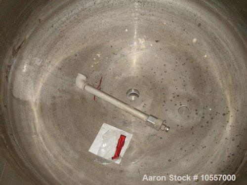 Used Fryma Model 400 Vacuum Mixer.  Includes (2) jacketed mixing tanks measuring 33.25" diameter x 38" deep.  Agitation has scrape surface, auger and dispenser.  Hydraulic bowl lift.  Machine footpri...