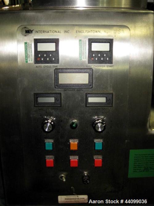 Used Key High Shear Granulating Mixer, Model KG5, Stainless Steel. (3) Bowls, top mounted chopper, on base. Serial# J1-2902.
