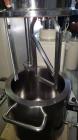 Used 15 Liter Hongyun Vacuum, Jacketed Double Planetary PowerMixer, Stainless Steel Model DLH-15. 15 Liter working capacity. Stainless Steel construction. 12