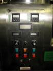 Used Key High Shear Granulating Mixer, Model KG5, Stainless Steel. (3) Bowls, top mounted chopper, on base. Serial# J1-2902.
