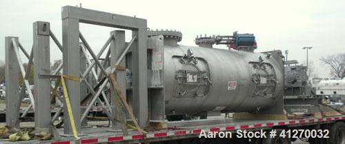 Used American Process Cylinrical Plow Mixer, Model CPB-135, 135 Cubic Feet Working Capacity (220 total), 304 Stainless Steel. 304 stainless steel jacket, chamber 56" diameter x 156" long, Internal ra...