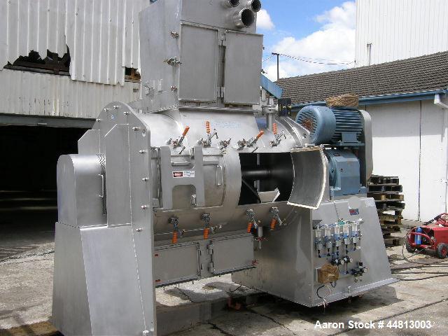 Used Gardner High Speed Plough Shear Mixer, Model PE3000.  1400 mm Diameter x 2100mm long.  2400 Liter capacity, 88 rpm, (4) 5.5 kw @ 2800 rpm tulip head intensifiers, discharge 2 x 470 mm long x 260...
