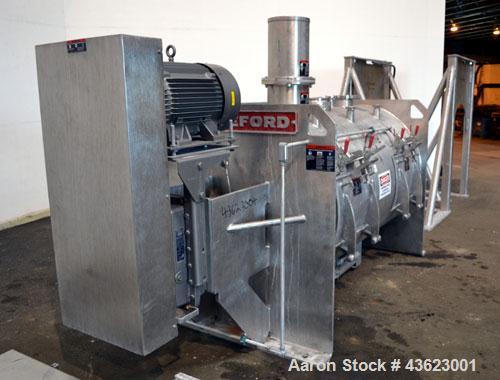 Used Littleford Batch Type Plow Mixer, Model FKM2000E, 321 Stainless Steel. 43 Cubic feet working capacity (73.5  total). Non-jacketed chamber approximate 50” diameter x 79” long. 5” Diameter shaft w...