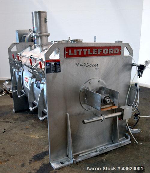 Used Littleford Batch Type Plow Mixer, Model FKM2000E, 321 Stainless Steel. 43 Cubic feet working capacity (73.5  total). Non-jacketed chamber approximate 50” diameter x 79” long. 5” Diameter shaft w...