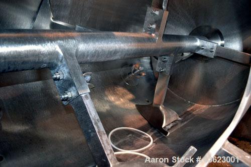 Used Littleford Batch Type Plow Mixer, Model FKM2000E, 321 Stainless Steel. 43 Cubic feet working capacity (73.5  total). Non-jacketed chamber approximate 50” diameter x 79” long. 5” Diameter shaft w...