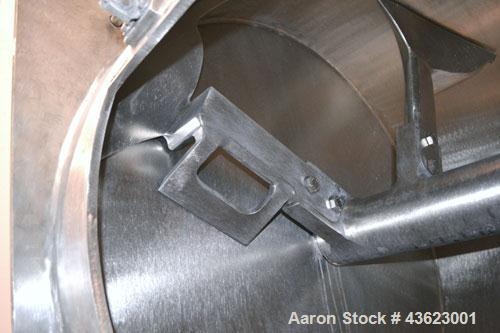 Used Littleford Batch Type Plow Mixer, Model FKM2000E, 321 Stainless Steel. 43 Cubic feet working capacity (73.5  total). Non-jacketed chamber approximate 50” diameter x 79” long. 5” Diameter shaft w...