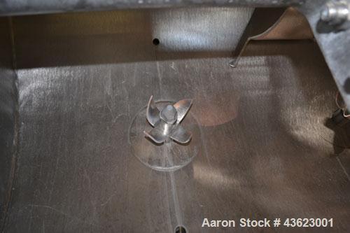 Used Littleford Batch Type Plow Mixer, Model FKM2000E, 321 Stainless Steel. 43 Cubic feet working capacity (73.5  total). Non-jacketed chamber approximate 50” diameter x 79” long. 5” Diameter shaft w...