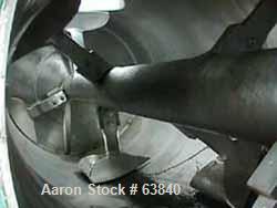Used Littlford Batch Type Plow Mixer, Model FKM1200D, 304 Stainless Steel. 26.1 cubic feet working capacity (43.4 total). Carbon steel jacketed chamber 31.13" diameter x 98-1/4" long, rated 75 psi at...