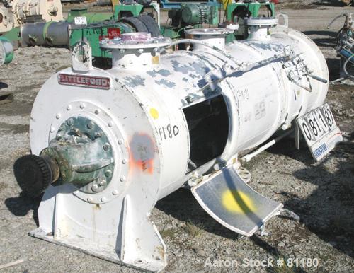 USED: Littleford plow mixer, model FKM1200D, batch type. 26.1 cubic foot working capacity, 43.4 total, 316 stainless steel. Non-jacketed chamber 32" diameter x 99" straight side. 5" diameter shaft wi...