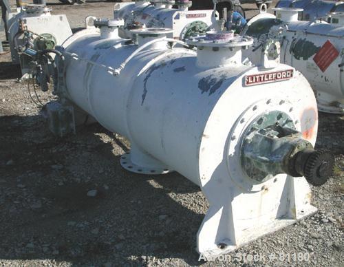 USED: Littleford plow mixer, model FKM1200D, batch type. 26.1 cubic foot working capacity, 43.4 total, 316 stainless steel. Non-jacketed chamber 32" diameter x 99" straight side. 5" diameter shaft wi...
