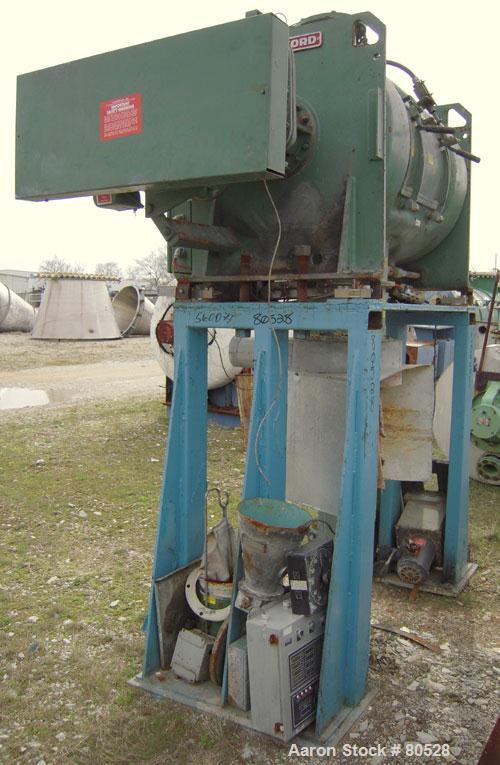 Used Littleford Plow Mixer, Model FKMD600, Carbon Steel. 11 Cubic feet working capacity, 21.9 total. Jacketed chamber 32" diameter x 49" straight side, rated 75 psi at 325 deg F. Approximate 5" diame...