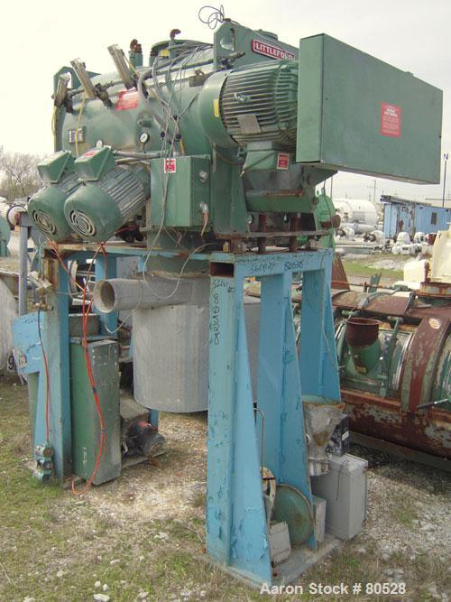 Used Littleford Plow Mixer, Model FKMD600, Carbon Steel. 11 Cubic feet working capacity, 21.9 total. Jacketed chamber 32" diameter x 49" straight side, rated 75 psi at 325 deg F. Approximate 5" diame...