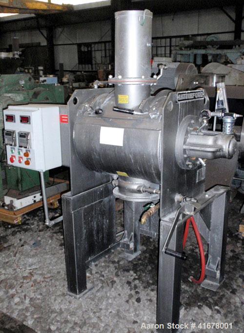 Used Littleford Batch Type Plow Mixer, model FM130-D, stainless steel. 3 cubic feet working capacity, 4.6 total. Jacketed chamber 19" diameter x 26" long, rated 75 psi at 320 deg F. Bolt on plows. Ai...