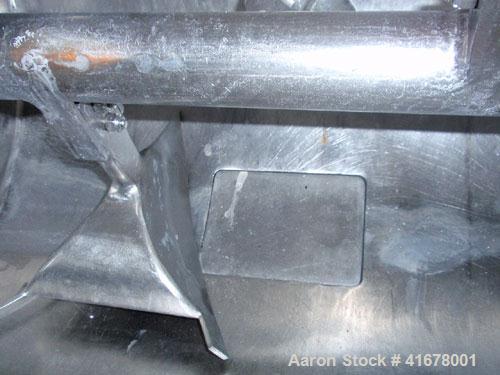 Used Littleford Batch Type Plow Mixer, model FM130-D, stainless steel. 3 cubic feet working capacity, 4.6 total. Jacketed chamber 19" diameter x 26" long, rated 75 psi at 320 deg F. Bolt on plows. Ai...