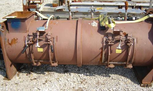 USED: Littleford continuous mixer, model KM-600-D. 25 hp, 1775 rpmdrive motor with Falk shaft mount speed reducer, model 2215J-09,ratio 8.997:1. Unit has four mounting brackets for choppers. Choppers...