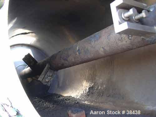 Used Littleford Model KM600D Plow Mixer. Continuous. 304 Stainless construction. 21.2 cubic foot total volume, 11.0 cubic foot working. Non-jacketed mix chamber 25" diameter x 78 3/4" long. 9 plows o...