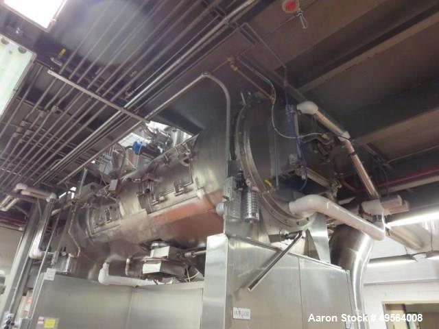 Used Processall 2000 Liter Jacketed Plow Mixer, Model 2000H. Stainless steel construction with (2) inspection doors, (4) 10 hp choppers, jacketed, with CSC filter. Serial# 81.