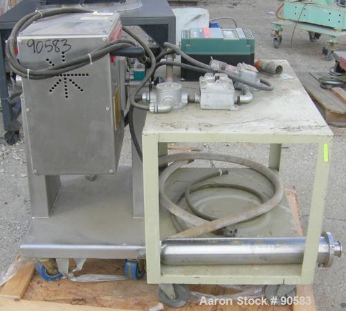 Used Processall Tilt-A-Mix Lab Size Plow Mixer, Model 4 H/V, 304 stainless steel. 2 liter working capacity (.07 cubic feet), 4 total. Non-jacketed chamber 6" diameter x 9" deep. 4 welded on plow blad...