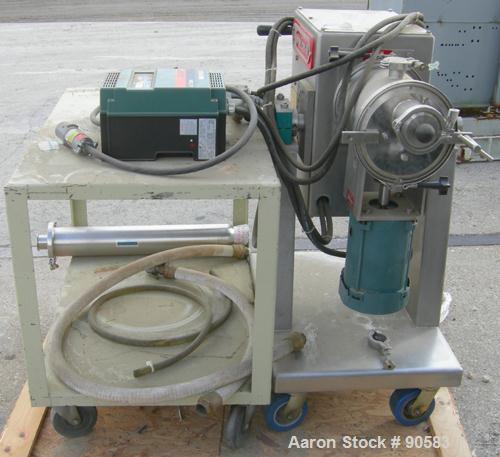Used Processall Tilt-A-Mix Lab Size Plow Mixer, Model 4 H/V, 304 stainless steel. 2 liter working capacity (.07 cubic feet), 4 total. Non-jacketed chamber 6" diameter x 9" deep. 4 welded on plow blad...