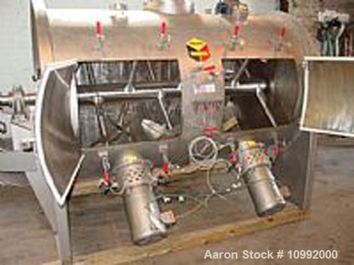 Unused-Used Scott Model SPPM547SS horizontal cylindrical plow type mixer. 60 cubic foot, stainless steel. Blender has two 10...