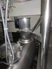 Used Processall 2000 Liter Plow Mixer, Model 20004L. stainless steel construction, sanitary welded plows, (2) viewing doors and (4) 10 hp choppers, with 100 hp drive motor through Falk gearbox. Seria...