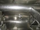 Used Processall 2000 Liter Jacketed Plow Mixer, Model 2000H. Stainless steel construction with (2) inspection doors, (4) 10 hp choppers, jacketed, with CSC filter. Serial# 81.