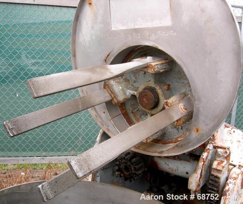 USED:Day pony mixer size 3. Working capacity 50 gallon, total 53gallon. (3) 28" diameter x 20" deep non-jacketed 301 stainless steelmixing cans. (4) 2" wide x 1/2" thick bolt-on paddles. Lift off cov...