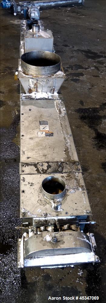 Used KWS Continuous Twin Shaft Paddle Mixer/Pug Mill, 304 Stainless Steel. (2) 6" Diameter x 165" long shafts with fixed paddles. Trough 13" wide x 165" long, bolt on top cover with openings. Driven ...