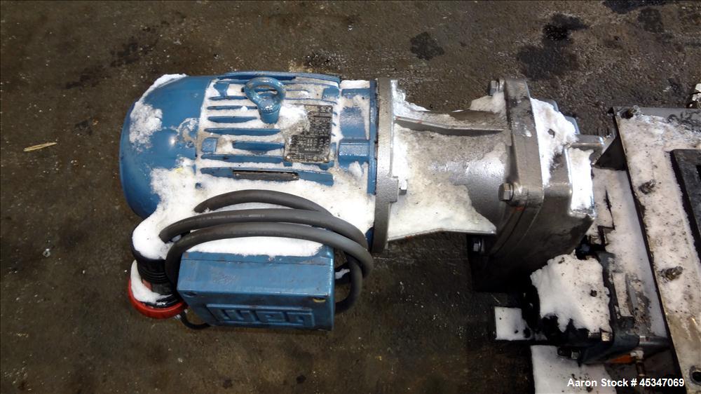 Used KWS Continuous Twin Shaft Paddle Mixer/Pug Mill, 304 Stainless Steel. (2) 6" Diameter x 165" long shafts with fixed paddles. Trough 13" wide x 165" long, bolt on top cover with openings. Driven ...